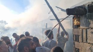 بالصور :ارتفاع عدد جرحى انفجار قارورة غاز وحريق بمخيم للنازحين السوريين جنوب صيدا