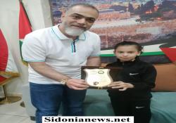 د. رياض أبو العينين يكرم بطلة الجمباز نور عباس بعد نيلها الميدالية الفضية ببطولة آسيا
