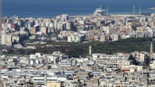 فجرا : تسليم شاحنات سلاح ثقيل  في مخيم عين الحلوة -صيدا للجيش اللبناني